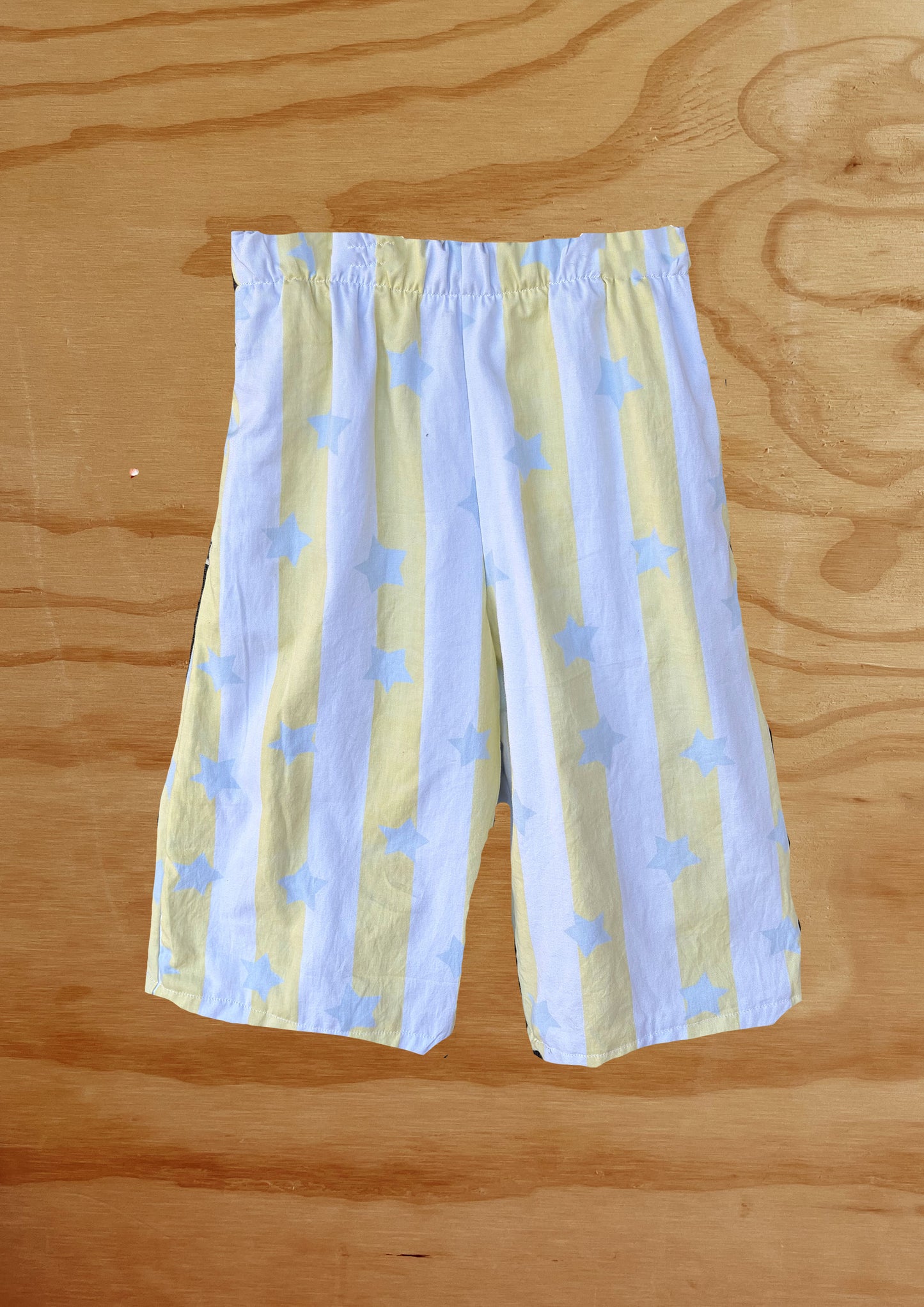 White and lemon stripe with blue star pant  Size / Age: 5