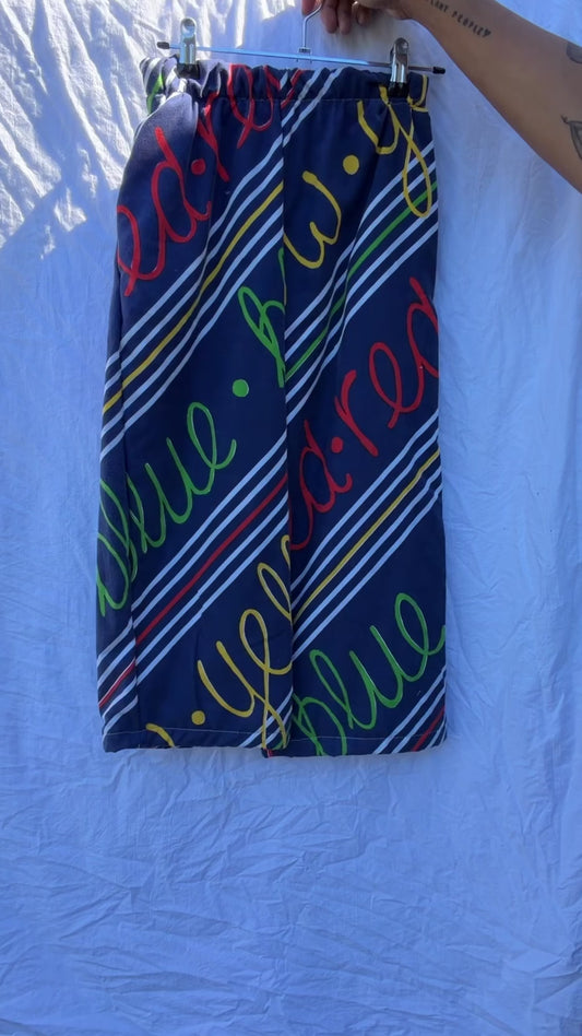Red Blue Yellow 80s retro print pant  Size / Age: 9-10